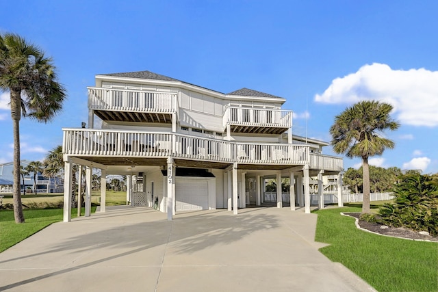 view of front of home featuring a garage and a carport