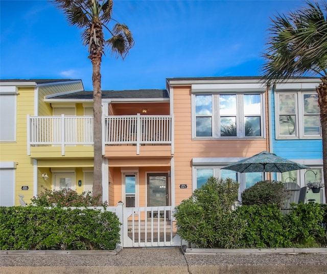 view of front of home with a balcony