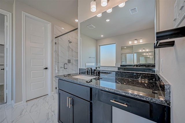 bathroom featuring vanity and walk in shower