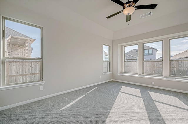 carpeted empty room with ceiling fan