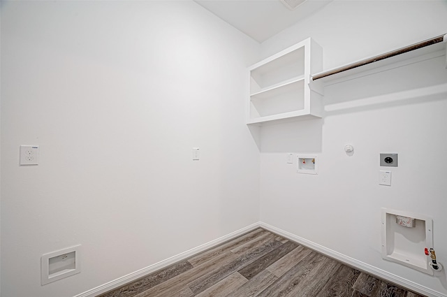 laundry area featuring hardwood / wood-style floors, hookup for a washing machine, gas dryer hookup, and electric dryer hookup