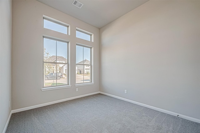 view of carpeted spare room