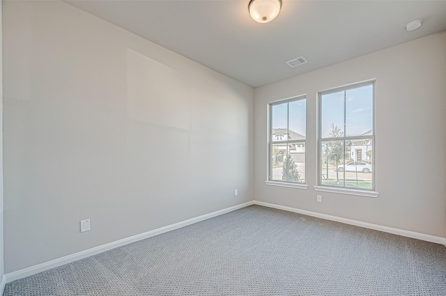 view of carpeted spare room