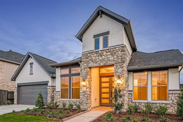 451 Papershell Path, Richmond, TX 77406 - view of front of home featuring stone siding, stucco siding, and concrete driveway