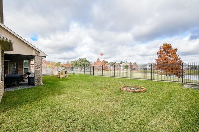 view of yard with a water view