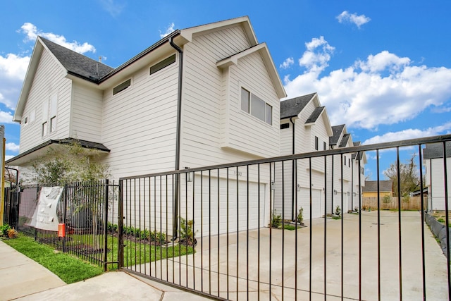 view of home's exterior with a garage