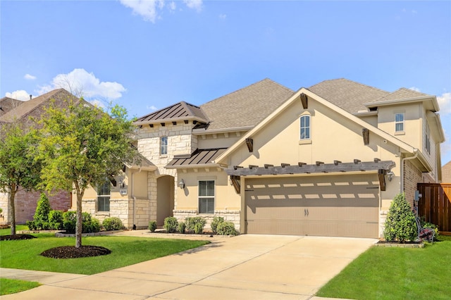 view of front facade with a garage and a front yard