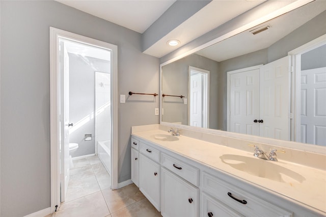 full bathroom featuring tile patterned floors, vanity, shower / bathtub combination, and toilet