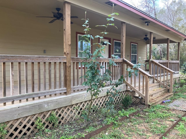 wooden deck featuring ceiling fan