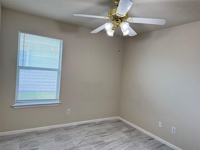 empty room with ceiling fan