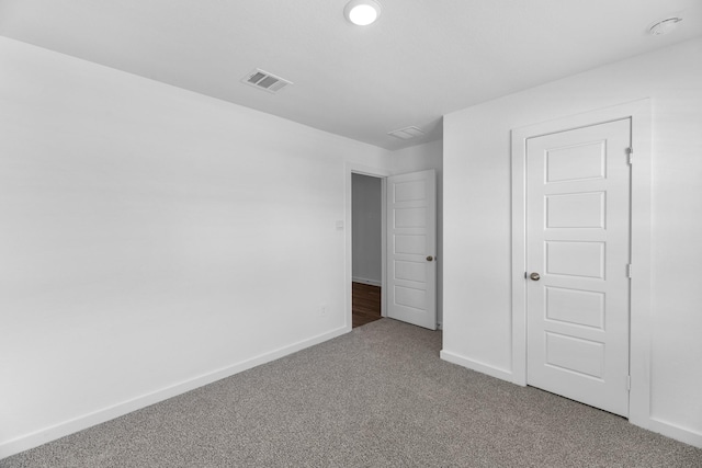 unfurnished bedroom featuring carpet