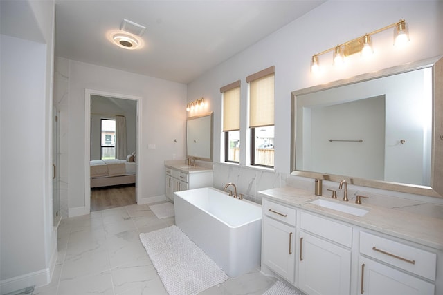 bathroom with a bathtub and vanity