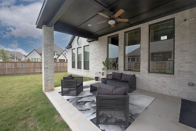 view of patio featuring ceiling fan and an outdoor living space