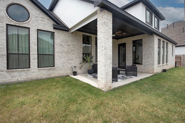 exterior space with a patio area and a yard