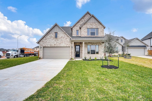 view of front of house featuring a front lawn and a garage