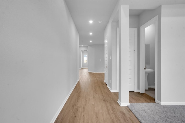 hallway featuring light hardwood / wood-style floors