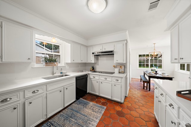 kitchen featuring black appliances, white cabinetry, sink, and a wealth of natural light