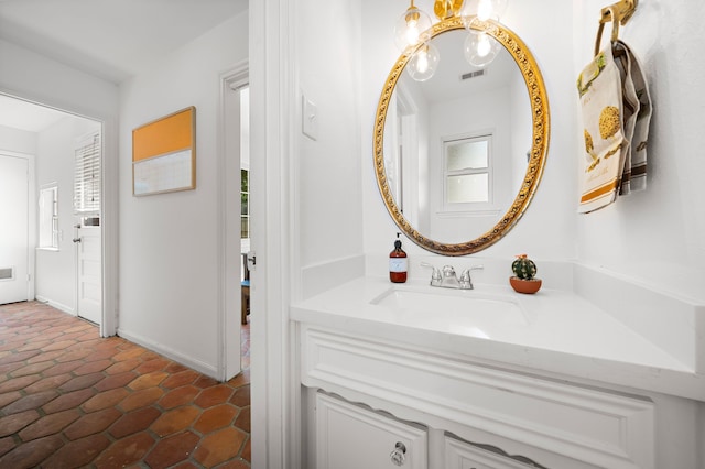 bathroom with vanity and tile patterned floors