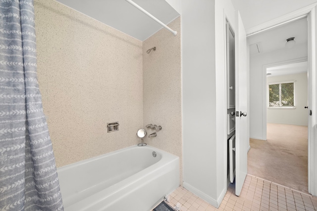 bathroom featuring tile patterned flooring and shower / bath combination with curtain