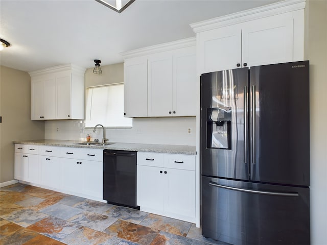 kitchen featuring white cabinets, sink, stainless steel refrigerator with ice dispenser, black dishwasher, and tasteful backsplash