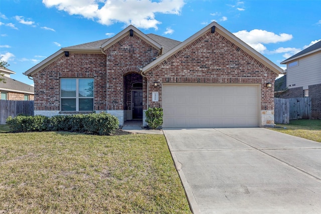 front facade featuring a garage and a front lawn