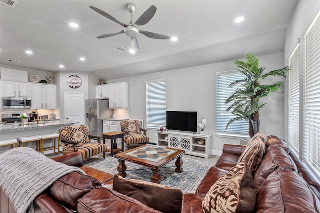 living room with ceiling fan