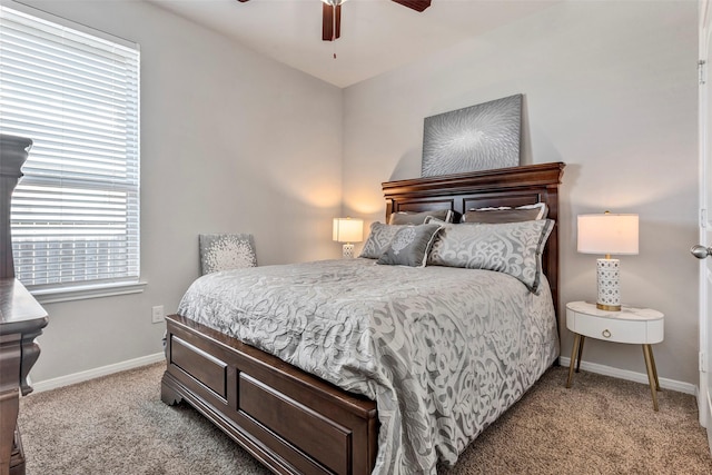 bedroom with light carpet and ceiling fan