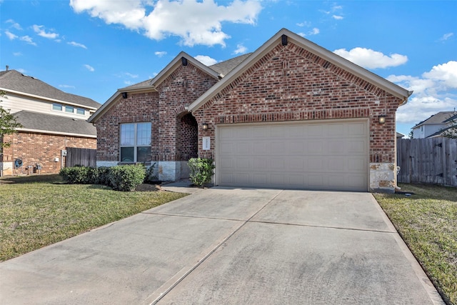 front of property with a front yard and a garage