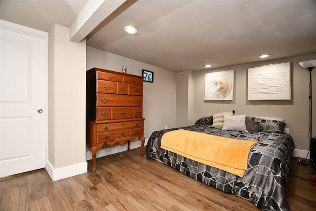 bedroom featuring hardwood / wood-style flooring