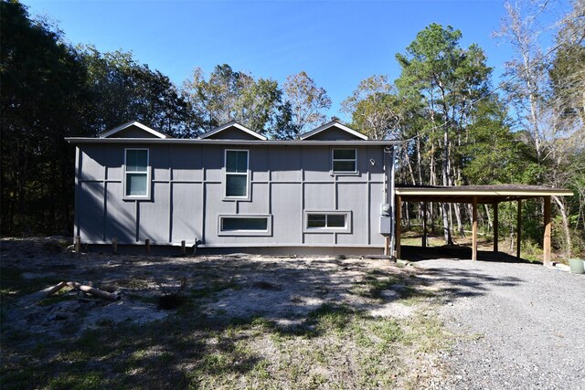 view of front of home with a carport