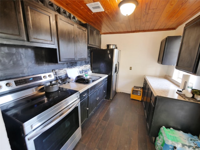 kitchen featuring ornamental molding, wood ceiling, dark brown cabinets, and appliances with stainless steel finishes