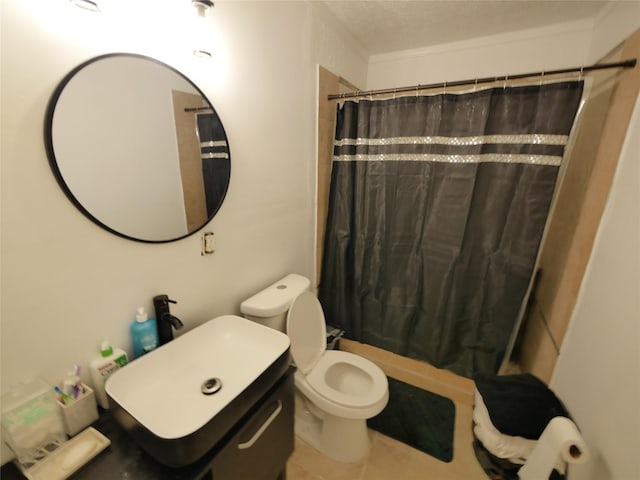 bathroom with curtained shower, sink, tile patterned flooring, a textured ceiling, and toilet