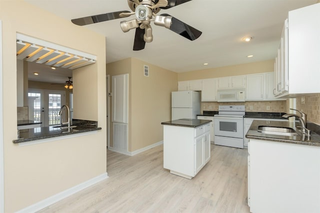 kitchen featuring white appliances, french doors, white cabinets, sink, and light wood-type flooring