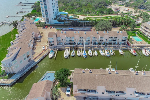 birds eye view of property with a water view