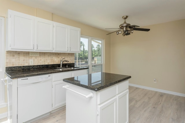 kitchen with a center island, dishwasher, sink, light hardwood / wood-style flooring, and white cabinets