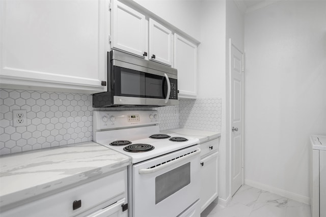 kitchen featuring decorative backsplash, white cabinets, white electric range oven, and light stone counters