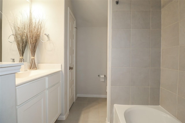 bathroom with tile patterned flooring and vanity