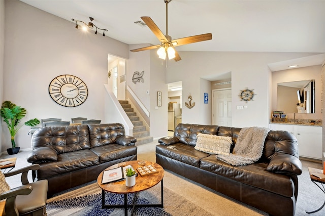 living room featuring ceiling fan, sink, carpet floors, and high vaulted ceiling