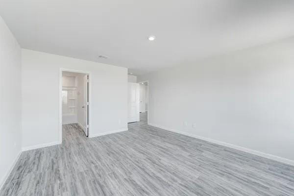 unfurnished bedroom featuring light hardwood / wood-style floors