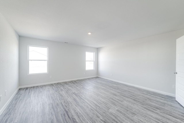 empty room with light wood-type flooring