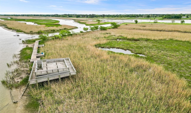 bird's eye view featuring a rural view and a water view