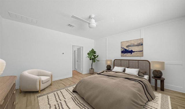 bedroom featuring ceiling fan and light wood-type flooring