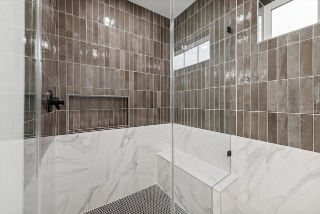 bathroom featuring walk in shower