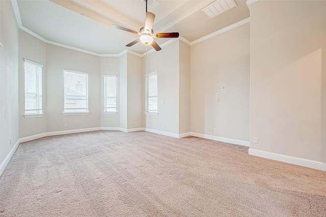 carpeted empty room featuring ceiling fan and ornamental molding