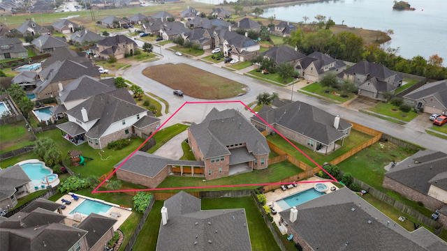 aerial view featuring a water view