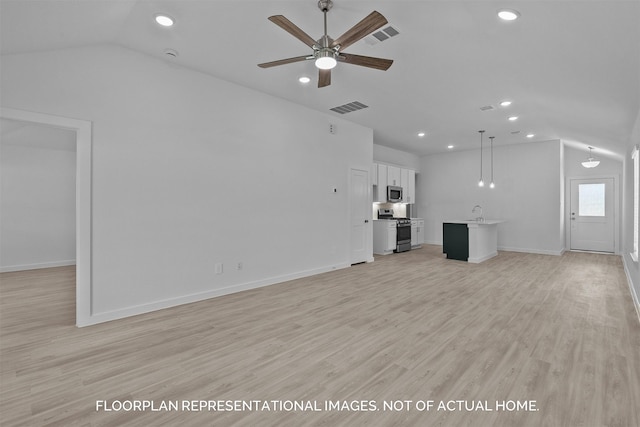 unfurnished living room with light hardwood / wood-style floors, ceiling fan, lofted ceiling, and sink