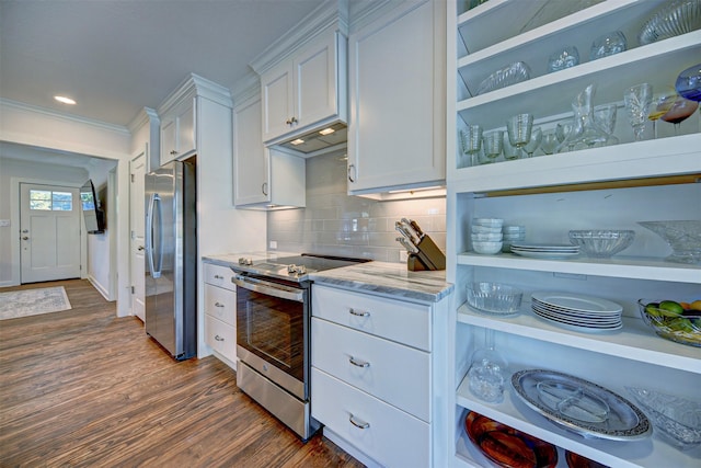 kitchen with stainless steel appliances, white cabinets, dark wood-type flooring, backsplash, and light stone counters