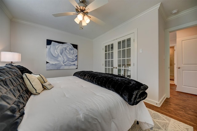 bedroom with ceiling fan, french doors, wood-type flooring, and ornamental molding