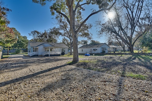 view of front of home featuring covered porch