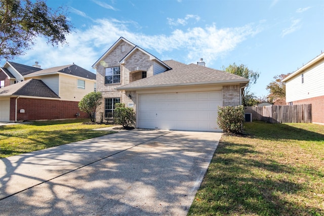 view of front property with a front lawn and a garage